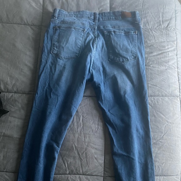 Judy Blue Denim - Judy Blue distressed jean. Camouflage fabric under the ripped areas.
